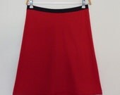 The Getaway Skirt by Miss Fancypants cotton lycra red with navy waist  Aline stretch jersey