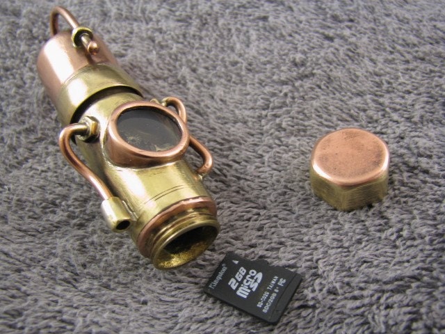 steampunk USB flash drive 8 GIG and micro SD card reader in one. Upgradeable memory.