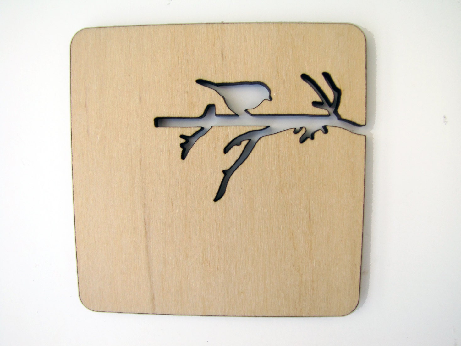 Laser cut wood coasters. Branch with bird and squirrel.