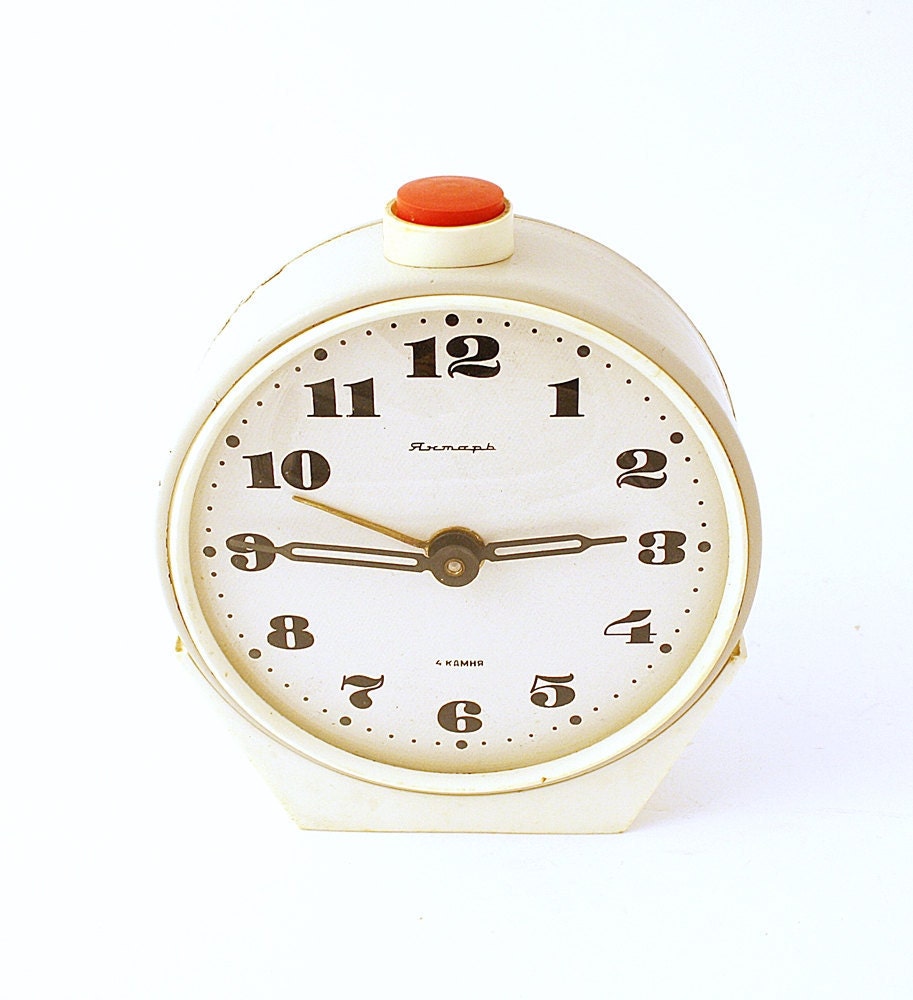 Vintage alarm clock Jantar from Soviet Union era grey color clock