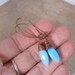TURQUOISE Blue  Faceted Marquise Glass and Copper Wire Wrapped Earrings.