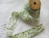 Fabric Ribbon 3 yds. of 1 inch wide hand frayed green floral cotton fabric ribbon on vintage wood thread spool