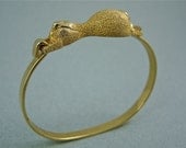 Vintage Kramer gold tone stretching lion bracelet
