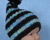Handmade knit striped baby beanie hat in multicolor blue/black with pom-pom