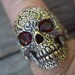 Sale....Sugar skull ring in sterling silver with blood red cz's for eyes