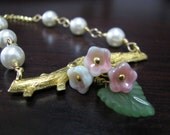 Brass Tree Branch with Pistachio Raspberry Blossoms and Frosted Green Leaf Necklace