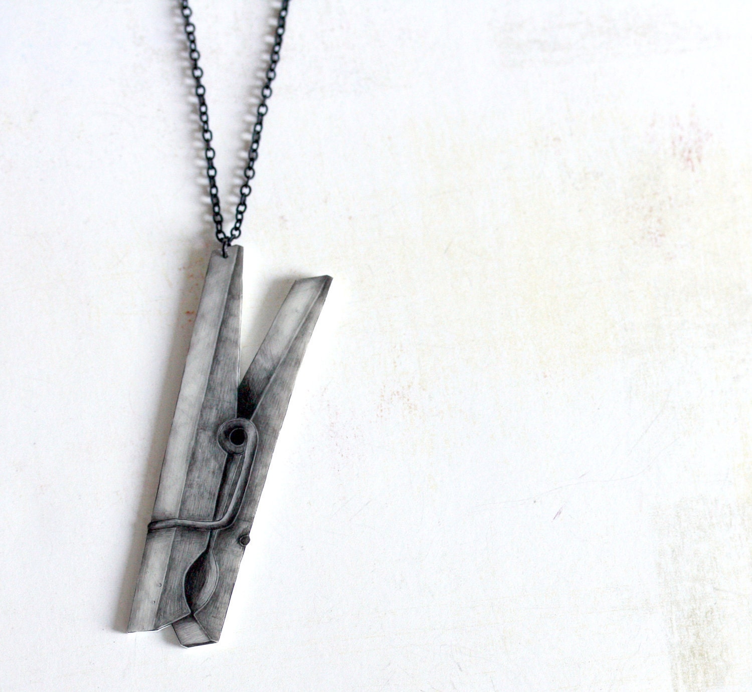 Laundry day -pendant, drawing on plastic