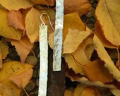 slim, slender and silver hammered earrings