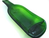 Recycled green wine bottle slumped into curved serving dish