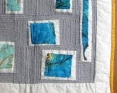 Wall Hanging Quilt of  'Pop Out' Blue Turquoise Squares with Orange Yellow Accent