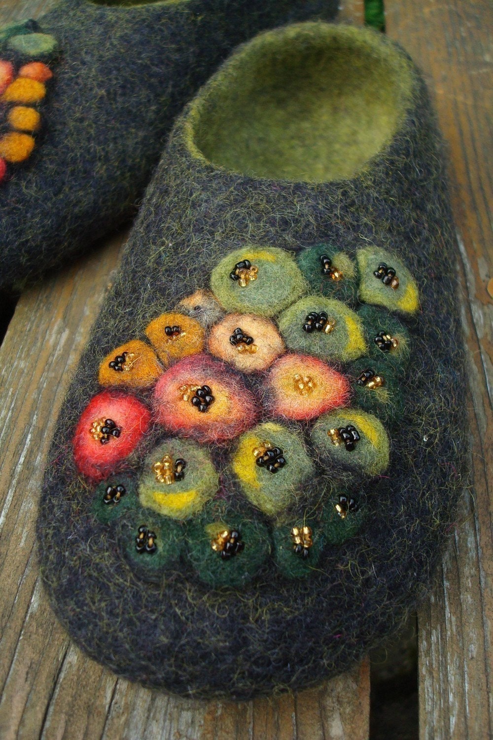 Felted black/green wool slippers with colorful decoration