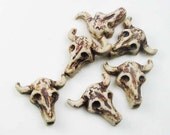 4 Tiny Highfired Cow Skull Beads