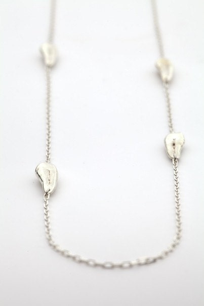 Sterling Silver and Cast Human Tooth necklace