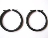 Large black wooden circular hoop stick earrings