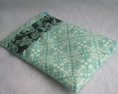 Turquoise Patterned Clutch with Brown and Blue Pleated Accent
