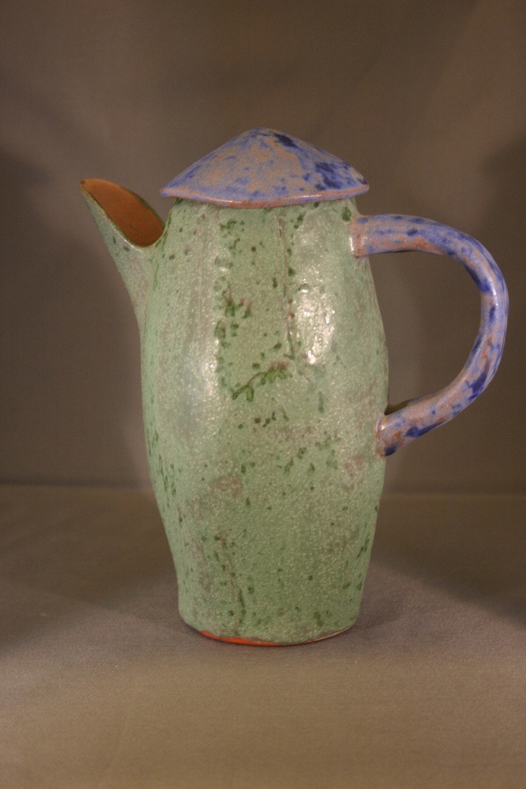 tall mottled pouring pitcher