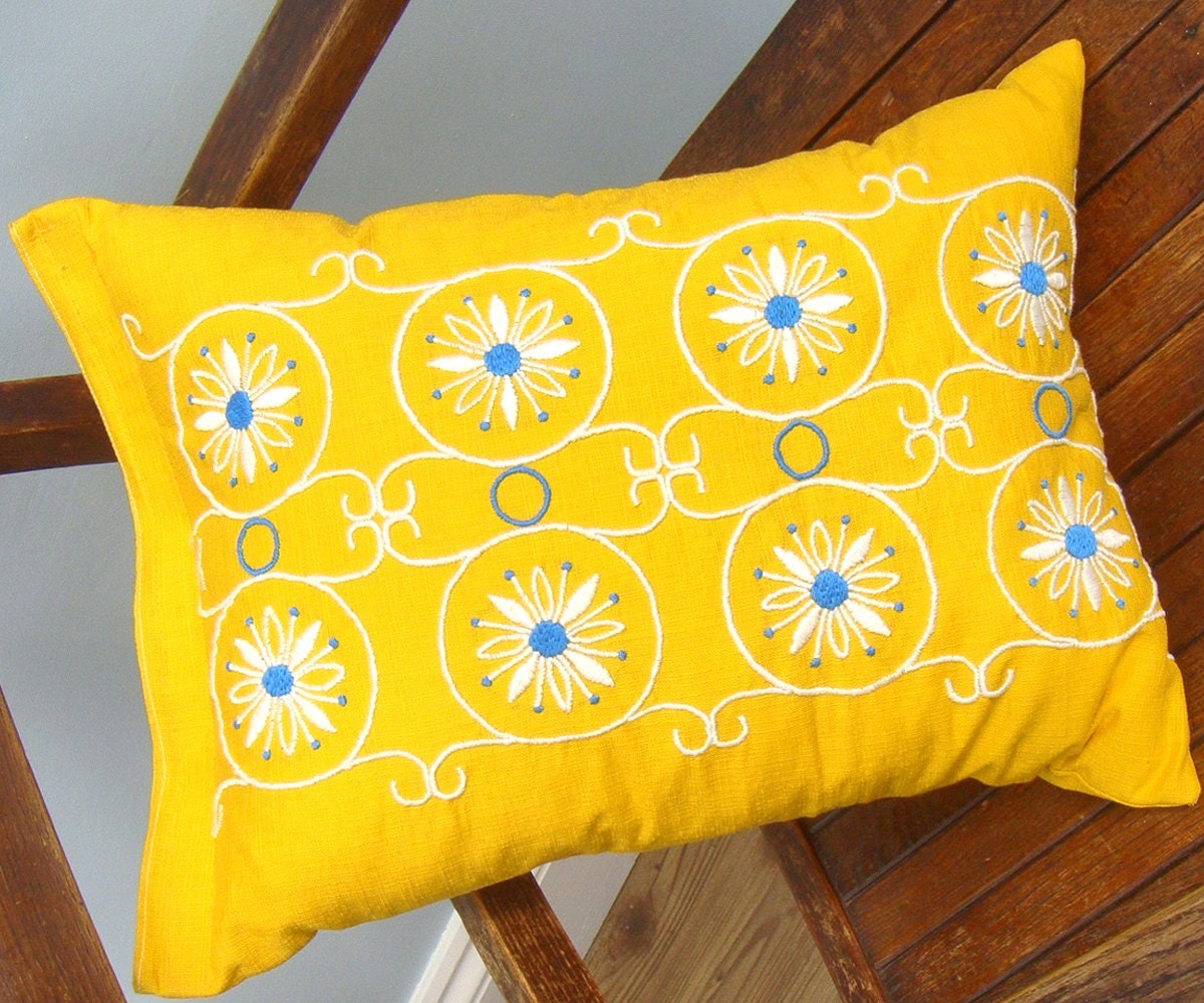 Yellow and blue vintage embroidered cushion