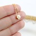 Tiny Gold Skull Necklace