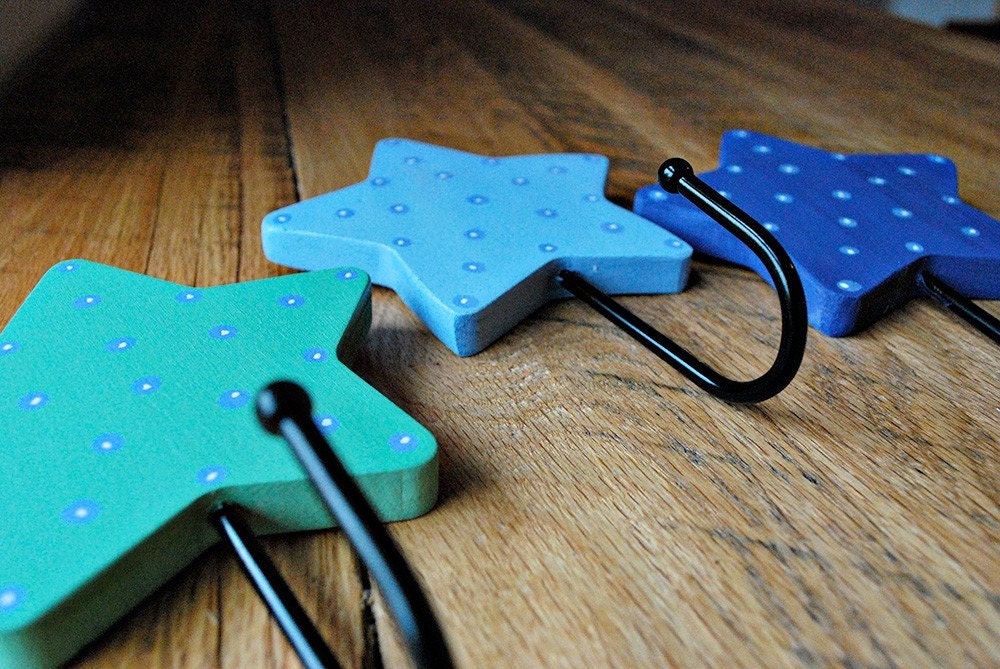 wooden star wall hooks hand painted children's room decor made to order by oscar & ollie