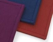 Men's Cotton Handkerchiefs in raspberry, midnight blue, and terra cotta