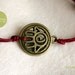 The luckiest-  Bracelet with hamsa charm and waxed cotton cord in dark red