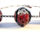 Grey Hollow Glass Bead Necklace with Red End Caps