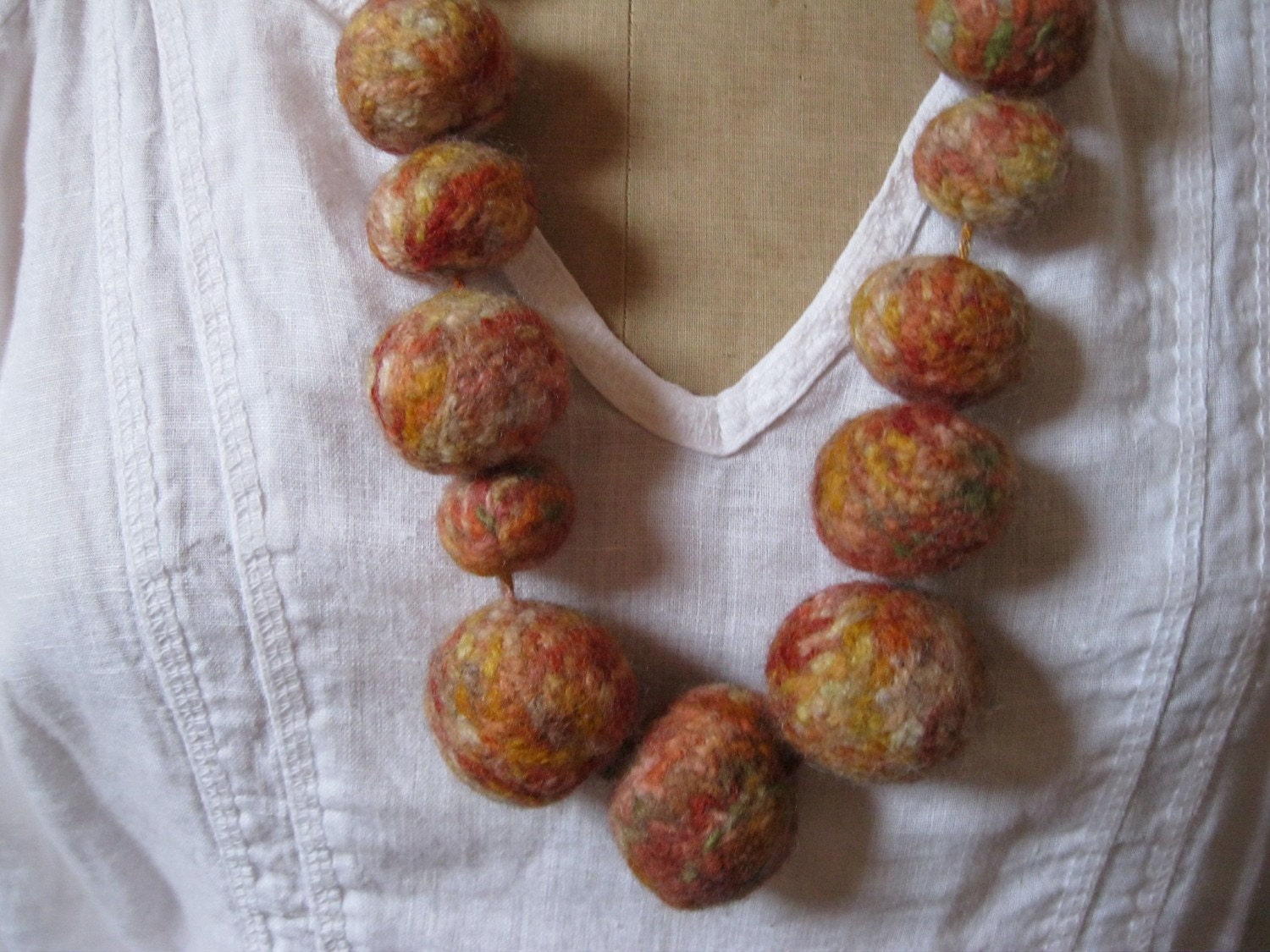 Knitted and Felted Wool Ball Necklace - 'Colours of autumn'