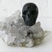 Large Quartz and Green Apatite Crystal with Hot Lava Stone Carved Skull