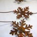 Rusty Tin Snowflake Garland 6 foot long with 3 and 3 quarters inch Snowflakes total of Six Snowflakes