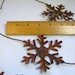 Rusty Tin Snowflake Garland 6 foot long with 3 and 3 quarters inch Snowflakes total of Six Snowflakes