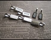 100 Tag Bails Perfect for Bottle Caps, Scrabble Tiles or Glass Tiles