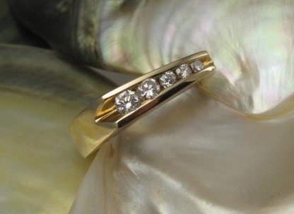 unique ring -- 14k yellow gold with cascading channel-set diamonds