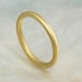 21k yellow gold domed wedding band / stacking ring, 2mm classic half round