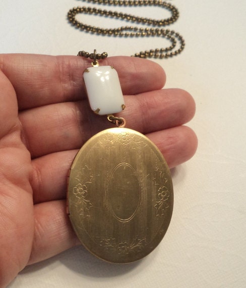 Milk glass and large vintage brass locket on long brass ball chain necklace.  Memory Keeper.