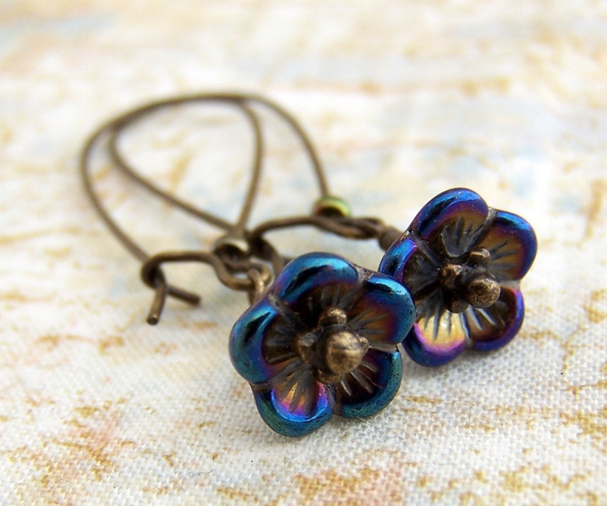 Blue and Purple Flower Earrings - Small iridescent blue and purple flower Czech glass beads, wire wrapped in antique brass