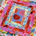 STUNNING blues, reds, pink -Kaffe Fassett. COUTURE Baby Blanket, Amazing craftsmanship and details, Minky fleece on back 30x34 QUILTED.