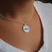 read charm necklace