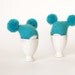 Turquoise egg warmers with funny poms