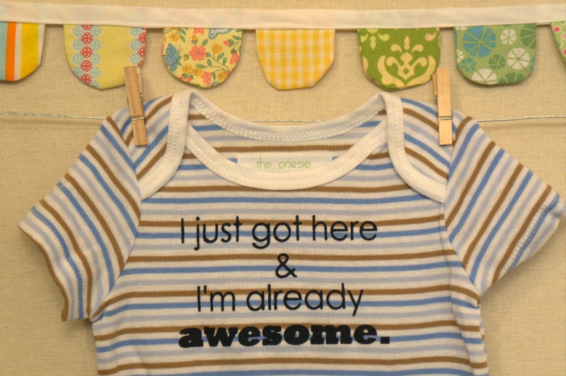 I just got here & I'm already awesome  --- blue striped onesie size 0-3 months.