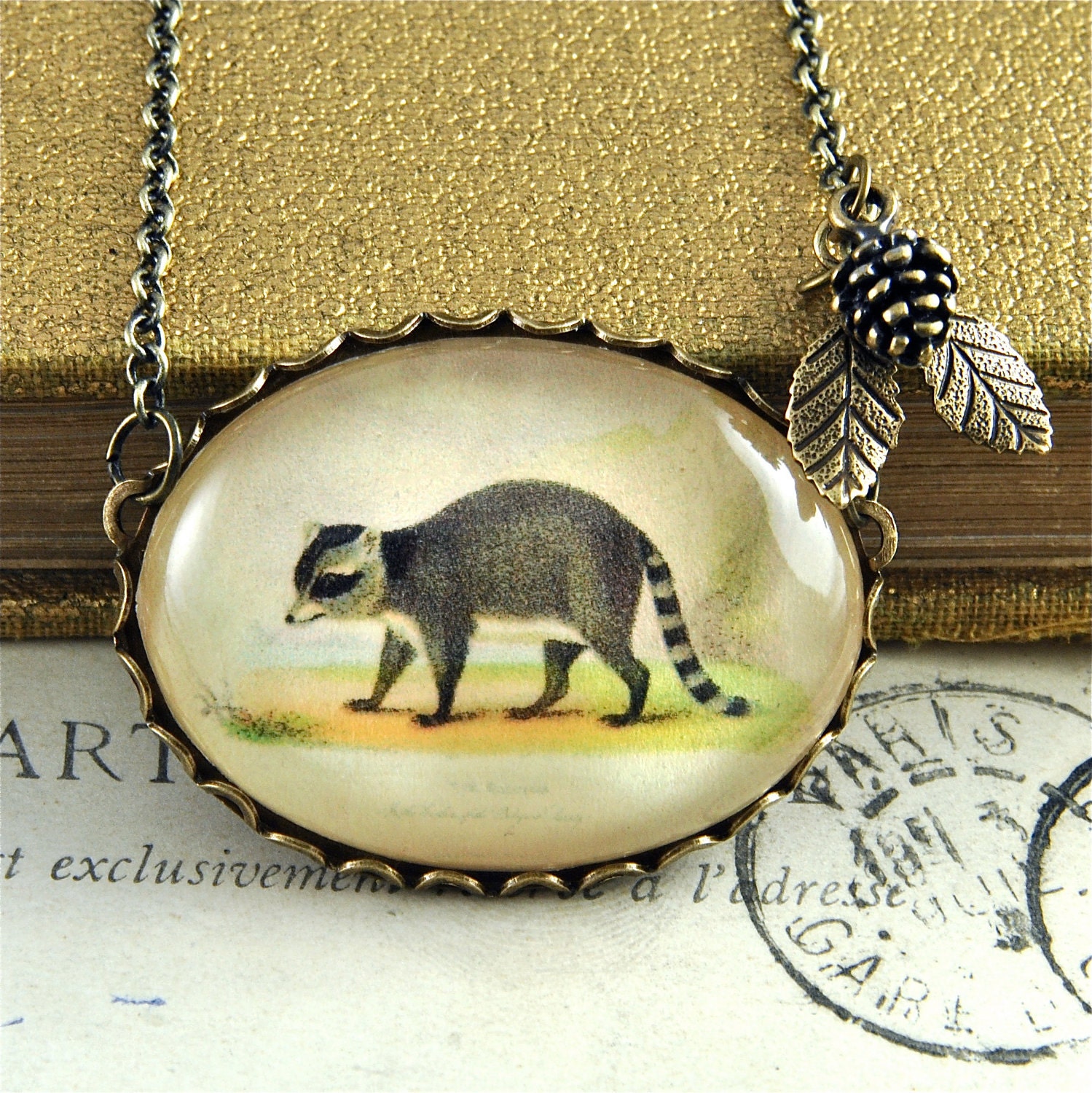 Bronze Raccoon Woodland Bubble Illustration Pendant Necklace with Leaf and Pinecone Accents Vintage Style