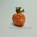 Halloween dollhouse upset faced pumpkin