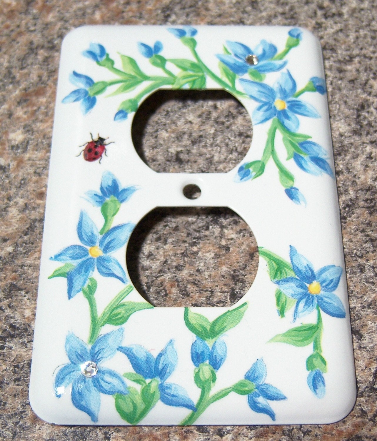 Blue floral steel outlet cover - swarovski crystals