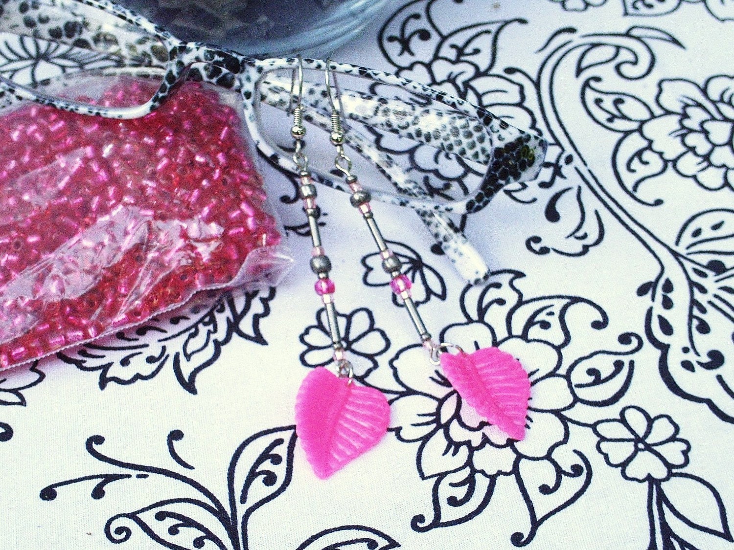 leaf earrings in spicy hot pink