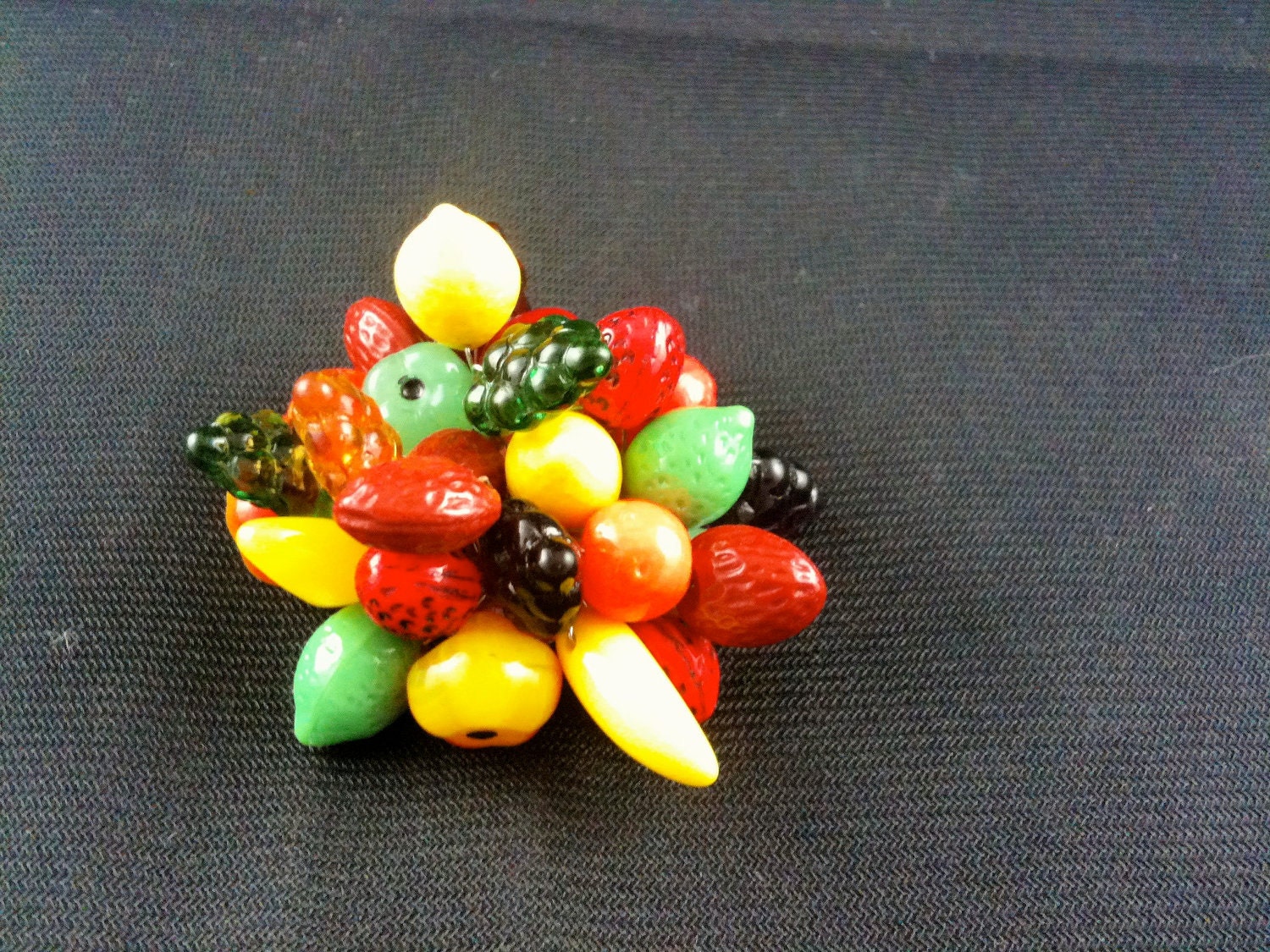 Glass fruit brooch