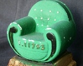Please have a seat. Vintage advertising ashtray.