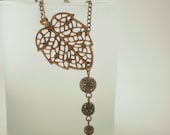 Antique Brass Leaf and Filigree Bead Necklace