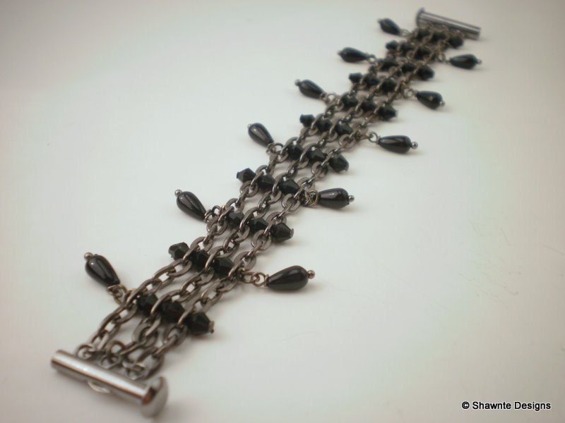 Gunmetal chain and black bead bracelet