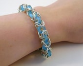 Sterling Silver Bracelet with Blue Donuts