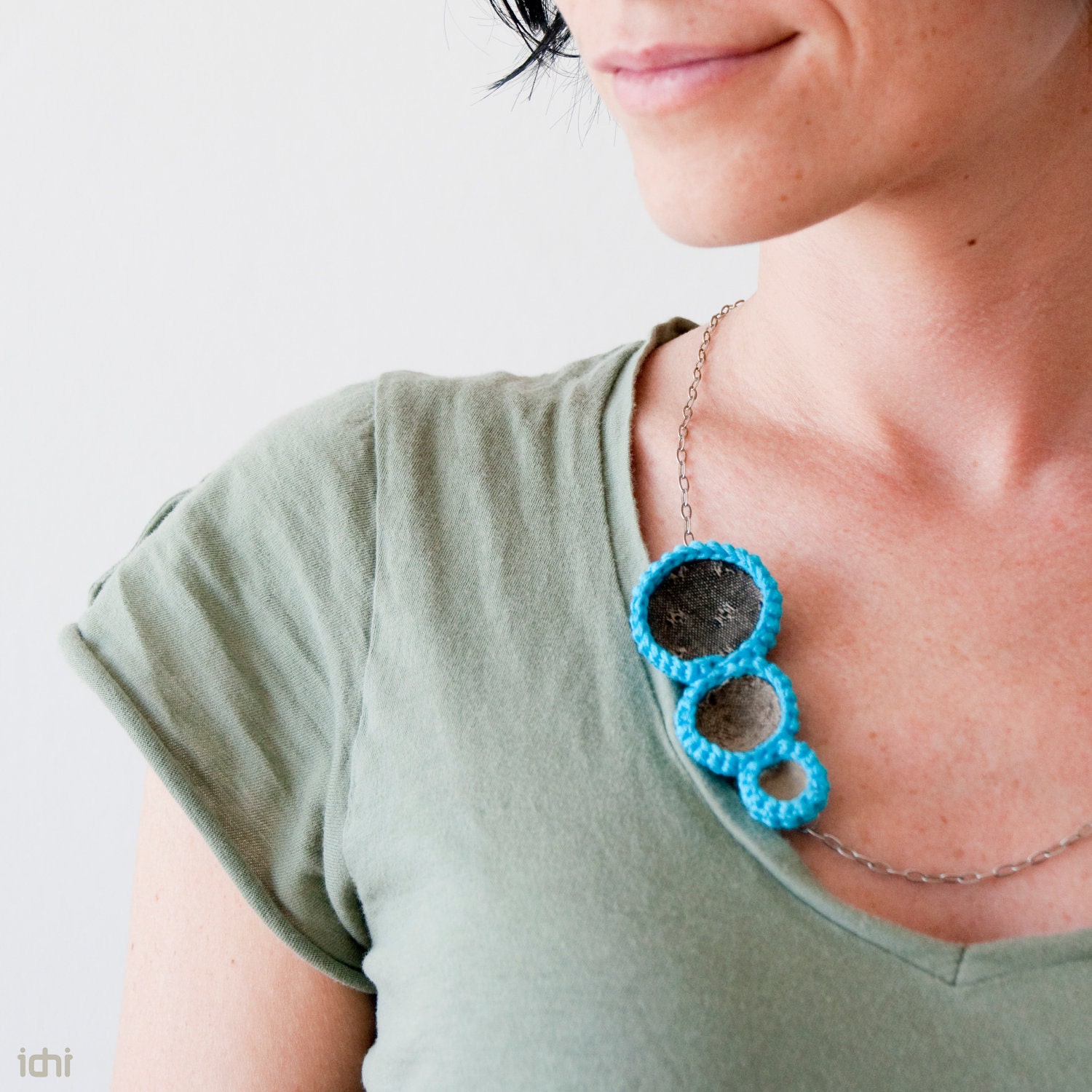 Crochet circles necklace with fabrics. Turquoise.