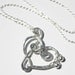 Sterling Silver Treble Clef and Bass Clef Heart Pendant Necklace
